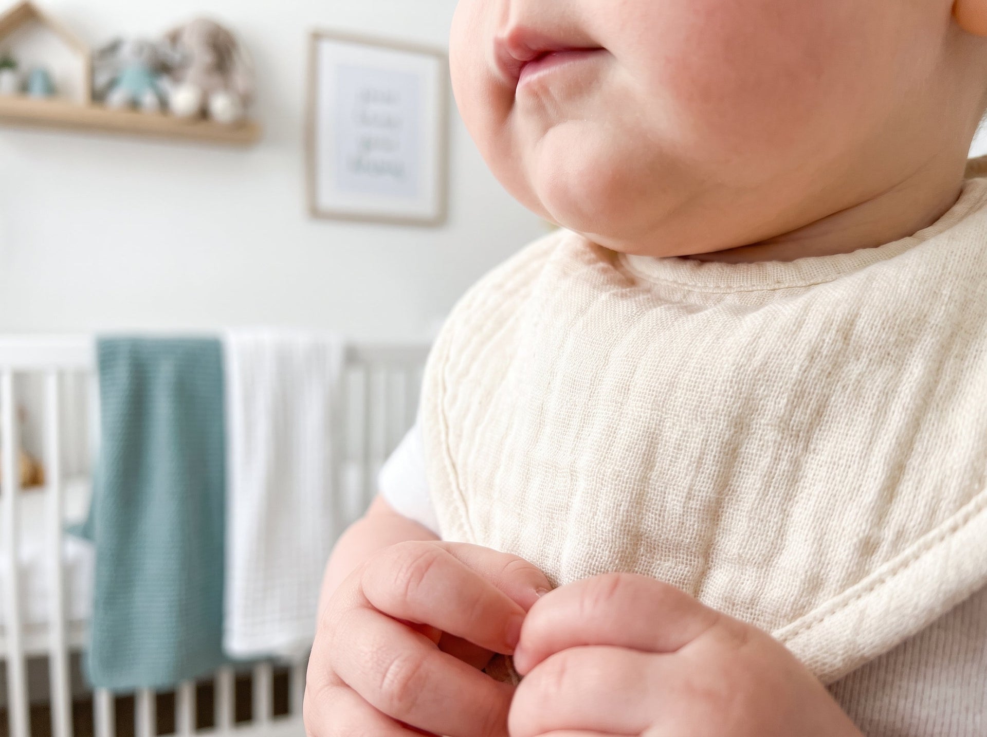 Protecting infant chin skin from drool rash and chafing using soft cloths and hygienic storage systems.